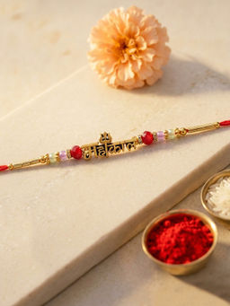 Karatcart - Gold Plated Mahakaal Letter Bhaiya Kundan Rakhi with Roli & Chawal