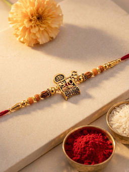 Karatcart - Brown Gold Plated Shiv Trishul Bhaiya Kundan Rakhi with Roli & Chawal
