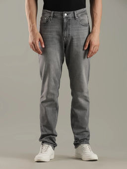 Tommy Hilfiger - Mid-Wash Slim Fit Mid Rise Jeans