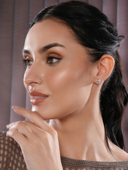 Aatmana - Rose Gold Plated American Diamond Studded Bow Shaped Contemporary Studs