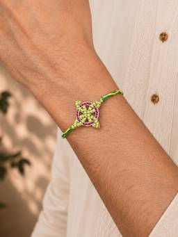 BeAbhika - Multicolor Floral Handcrafted Beaded Thread Rakhi with Roli Chawal Capsules