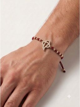 MINJI AND CO. - Love Knot Rakhi Gold Plated Brass with CZ Stone Adjustable Thread