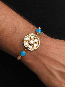 BeAbhika - White & Blue Floral Kundan Rakhi with Roli Chawal (Set of 2)