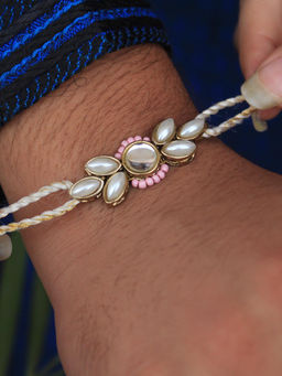 BeAbhika - White & Pink Elegance Redefined Rakhi with Roli Chawal (Set of 2)