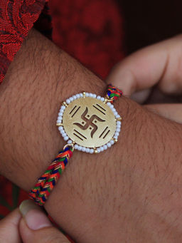 BeAbhika - Gold & White Beaded Swastik Rakhi with Roli Chawal (Set of 2)
