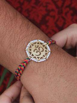 BeAbhika - Gold & White Beaded Om Rakhi with Roli Chawal (Set of 2)