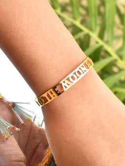 BeAbhika - Gold & Blue To The Moon & Back Golden Bhabhi Lumba Rakhi with Roli Chawal (Set of 2)