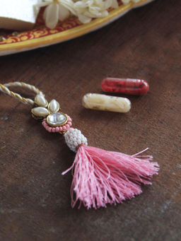 BeAbhika - Pink & White Kundan Bhabhi Lumba Rakhi with Roli Chawal (Set of 2)