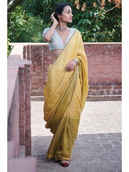 Dressfolk - multi toned handwoven yellow saree with detailed jamdani work and silver zari buttas.