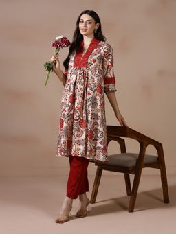 Shree - Women Cotton Beige Floral Printed Flared Kurta