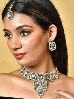 Silvermerc Designs - White Ethnic Gold Plated Kundan Necklace with Earrings and Maang Tikka