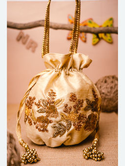 NR by Nidhi Rathi - Embellished Cream Batuas And Potlis