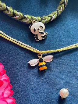 Digital Dress Room - Gold Plated Mini Honey Bee and Panda Charm Rakhis (Pack of 2)