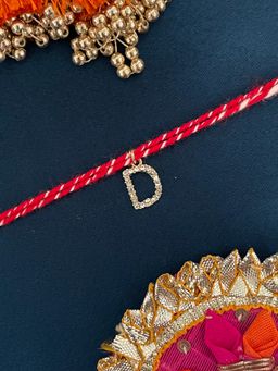 Digital Dress Room - D Letter Gold Plated Ad Stone Initial Charm Rakhi