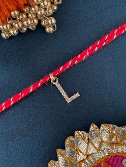 Digital Dress Room - L Letter Gold Plated Ad Stone Initial Charm Rakhi