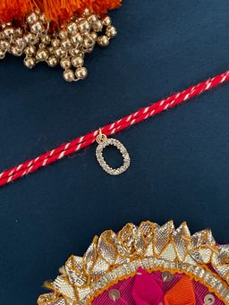 Digital Dress Room - O Letter Gold Plated Ad Stone Initial Charm Rakhi