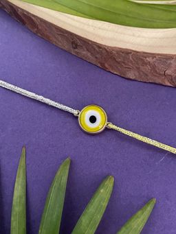 Digital Dress Room - Gold Plated Yellow Evil Eye Charm Rakhi