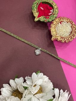 Digital Dress Room - Silver Plated Ad White Flower Stone Rakhi