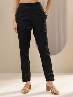 Libas - Black solid Regular fit Pant with attached lace on hem