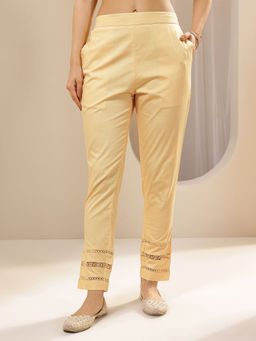 Libas - Beige solid Regular fit Pant with attached lace on hem