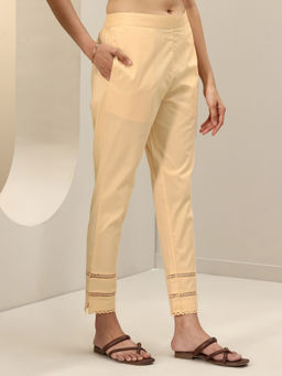 Libas - Beige solid Regular fit Pant with attached lace on hem