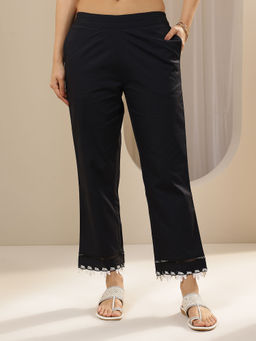 Libas - Black solid straight fit Pant with attached lace on hem
