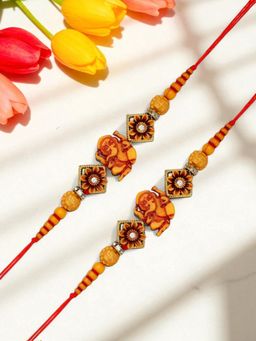 ADIVA - Pack Of 2 Handmade Lord Ganesha Stone Thread Rakhis With Roli Chawal Chandan & Card
