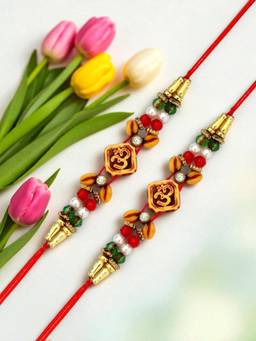 ADIVA - Pack Of 2 Om Symbol Cz Stone & Beads Thread Rakhi With Thali Roli Chawal Bag Gift Set