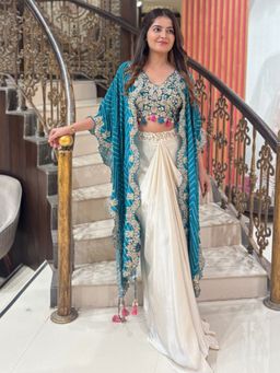Sindh Fashion - White Satin Floral Embroidered Blouse With Skirt And Cape