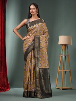 CHARUKRITI - Beige Blended Silk Handwoven Ajrakh Print Saree & Unstitched Blouse