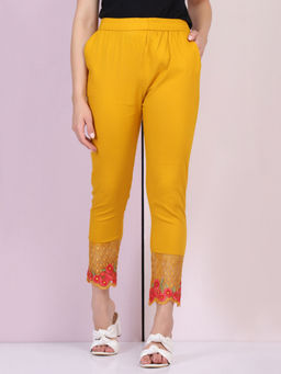 Buynewtrend - Women Cotton Silk Yellow Solid Skinny Leggings