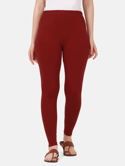 Buynewtrend - Women Cotton Maroon Solid Skinny Leggings
