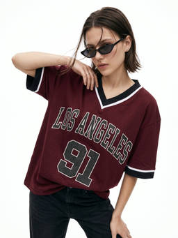 Outzidr - Women Maroon Contrast V Neck Varsity Graphic Printed Oversized T-Shirt