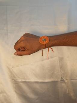 MEESA - Orange Anchor Threads Rakhi