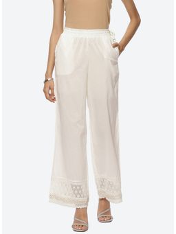 Lakshita - Off White Palazzos With Shimmery Details At The Palazzo
