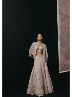 Twenty Nine - Silver Zari Mirrorwork Lehenga with Cape Sleeves Jacket and Bralette