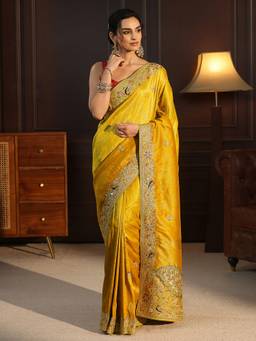 Libas Art - Mustard Floral Zari Stone Work Woven Design Saree With Embroidered Border and Blouse Piece