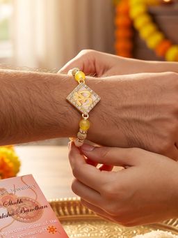 LUCKY JEWELLERY - Designer Square Om Gold-Tone Rakhi For Brother With Roli Chawal and Card