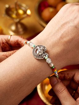 LUCKY JEWELLERY - Silver-Tone Bal Gopal Krishna Beaded Rakhi Set for Brother Roli Chawal and Card