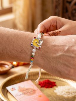 LUCKY JEWELLERY - Lord Ganesha Silver-Finish Yellow Enamel Beaded Rakhi For Brother Roli Chawal, Card