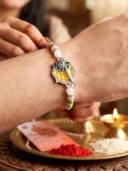 LUCKY JEWELLERY - Silver-Finish Krishna Flute Bansuri Mor Pankh Beaded Rakhi Set For Brother