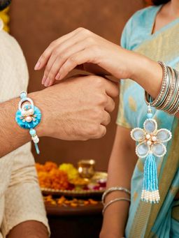 LUCKY JEWELLERY - Lumba with White Beads Rakhi for Brother and Bhabhi (Pack of 2)