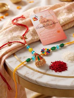 LUCKY JEWELLERY - Bhaiya Bhabhi Rakhi Set with Floral Centrepiece and Lumba, Roli Chawal (Pack of 2)