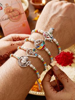 LUCKY JEWELLERY - Silver-Toned Bal Krishna and Peacock Beaded Rakhi Combo for Brother (Pack of 4)