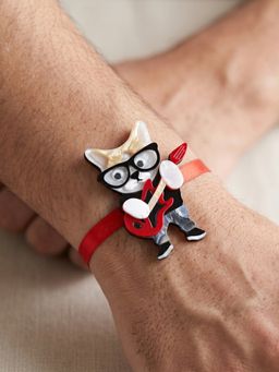 LUCKY JEWELLERY - Kids Rockstar Cat Guitar Acrylic Charm Rakhi Red Ribbon Roli Chawal