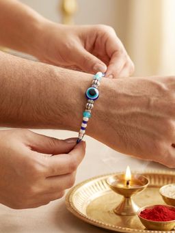 LUCKY JEWELLERY - Blue Evil Eye Rakhi with Greeting Card and Roli Chawal Set for Raksha Bandhan