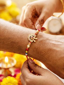 LUCKY JEWELLERY - Designer Krishna Flute and Peacock Rakhi Set For Brother Roli Chawal And Card