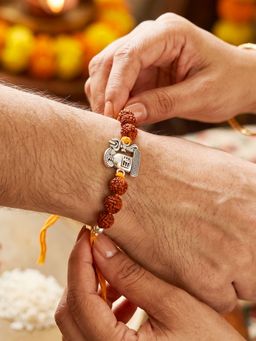 LUCKY JEWELLERY - Silver Spiritual Shivling Trishul Rakhi for Brother Rudraksha Roli Chawal