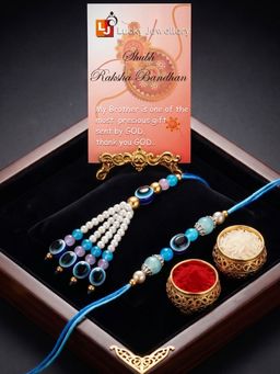 LUCKY JEWELLERY - Bhaiya Bhabhi Evil Eye Lumba Rakhi with Roli Chawal and Card (Pack of 2)