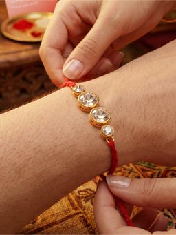 LUCKY JEWELLERY - Rakhi for Bhaiya/Bhabhi Red Thread Raksha Bandhan Rakhi (Pack of 1)